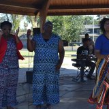 Dominque Davis, Sister Davis and Brittany Jenkins sing.